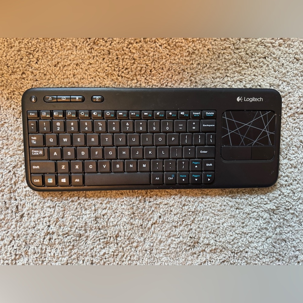 Logitech Black Compact Wireless Keyboard with Built‑in Touchpad